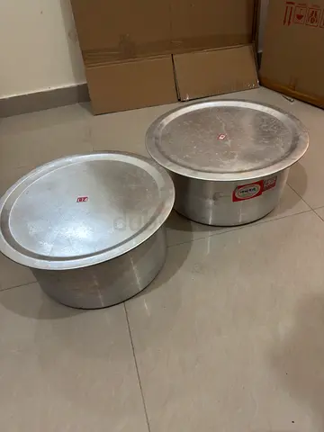 Two large aluminum cooking pots with lids - used