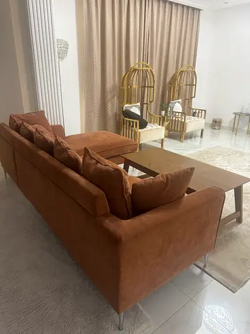 Comfortable 3-seater brown suede sofa in excellent condition
