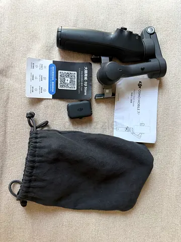 DJI Osmo Mobile 7 gimbal with pouch and manual - good condition