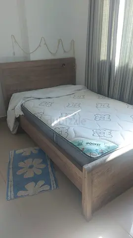 Single wooden bed frame with pocket-spring mattress - light oak