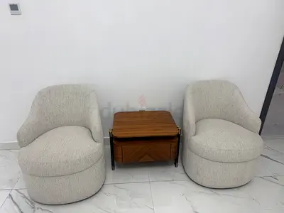 Pair of Modern Cream Upholstered Accent Chairs with Wooden Side Table