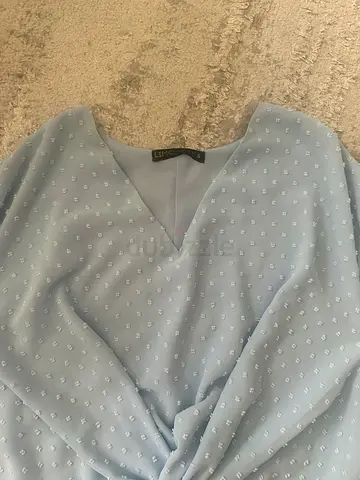 Light blue women’s work blouse