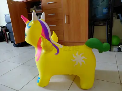 Inflatable/Jumping Unicorn Hopper Toy - Bright Yellow, Good Condition