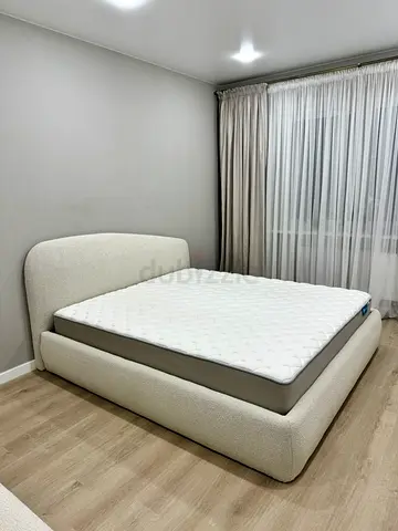 Modern upholstered double bed - cream boucle