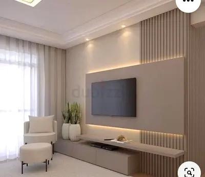 Modern wall-mounted TV entertainment unit with floating console — beige/neutral