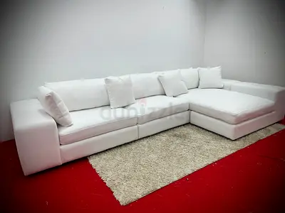Like new condition eichholtz brand lshape sofa