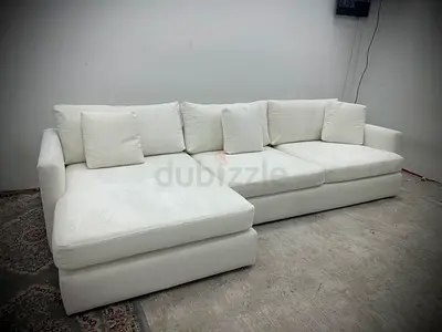 As perfect condition cratebarrel lshape sofa