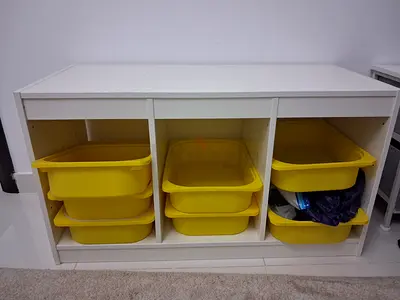 White 3-Compartment Storage Unit with Yellow Plastic Bins