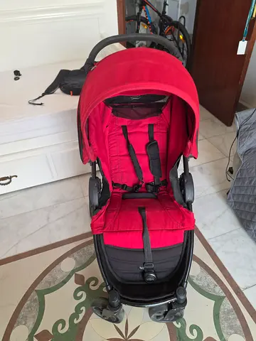 Red baby stroller/pram in good condition