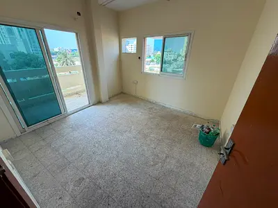 Two bedrooms and a living room | Balcony | 2 bathrooms | AED 27,000 per year | Accommodation right