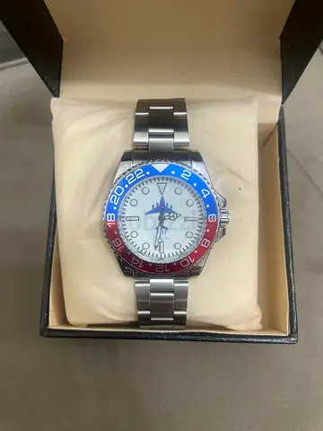 C17 spirit of Dubai Stainless Steel Mens GMT-Style Watch with Blue  Red Bezel