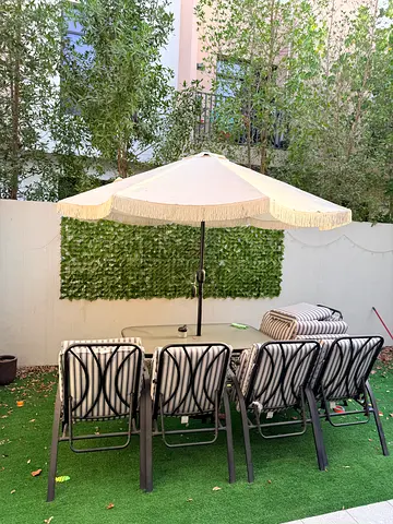Danube Home Outdoor dining set with parasol and 6 cushioned chairs and umbrella