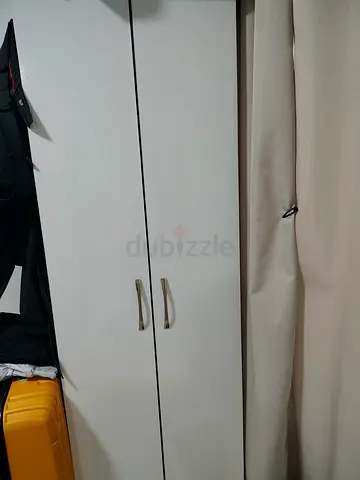 White two-door wardrobe / armoire in good condition
