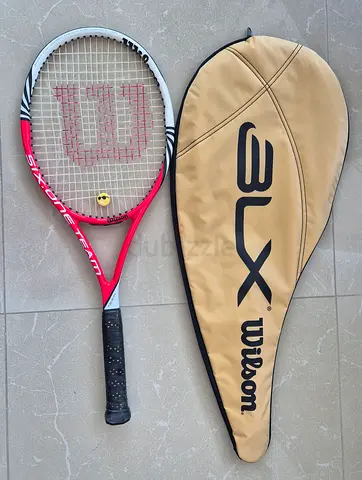 Wilson tennis racket with cover - used, very good condition, and tennis bag in very good condition.