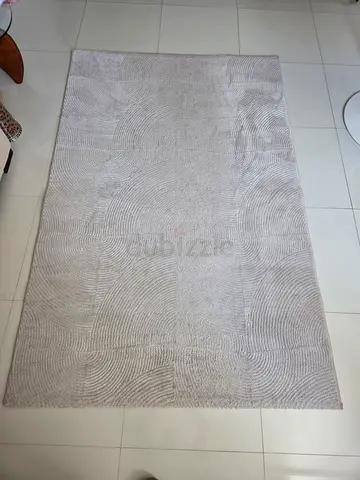 Light beige textured modern area rug - gently used 2.3x1.6m