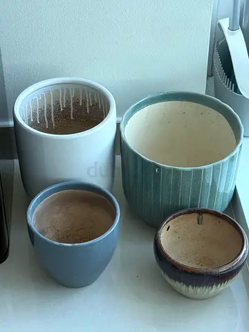 Set of 4 ceramic plant pots / planters - used, good condition