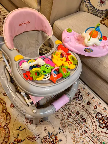 Pink Baby Walker with step up pottie