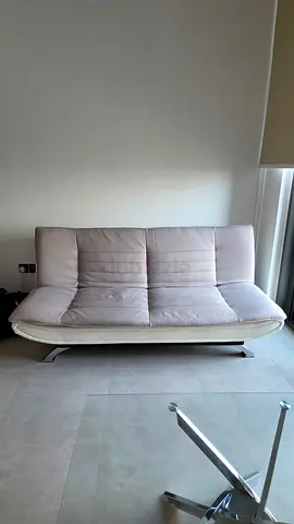 Stone grey 2-seater sofa bed in good condition