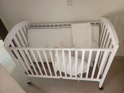 White Wooden Baby Crib with Mattress and Bedding