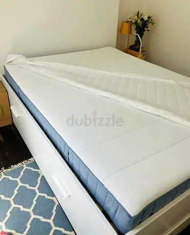 IKEA Brimness Queen size bed frame with mattress.
