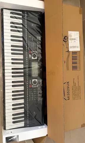 Brand New Portable 61-Key Electronic Keyboard with Box - Never Opened