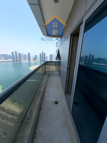 For sale: A distinctive apartment in a prime tower in Al Khan, boasting stunning views of Al Khan Beach and the city skyline, and offering spacious li