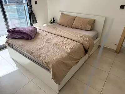 White wooden double bed frame with storage - good condition