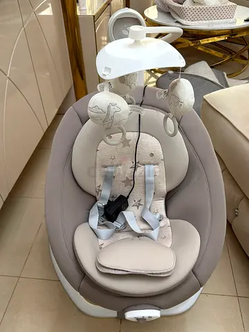 NEVER used - Joli baby swing 2 in 1.