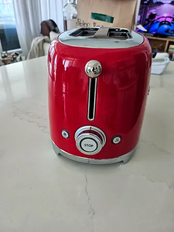 Red 2-Slice Toaster in Good Condition