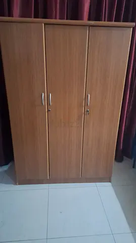 3 door wooden cupboard