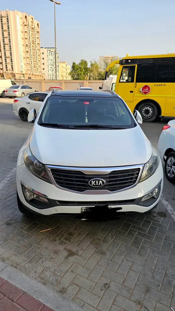 Kia Sportage 2014 — photo 1 of 7