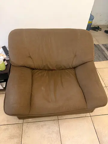 Single brown fabric armchair — comfortable, good condition