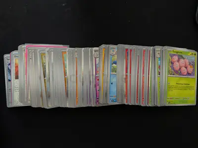 Surging Sparks Pokemon cards - 250 cards approx