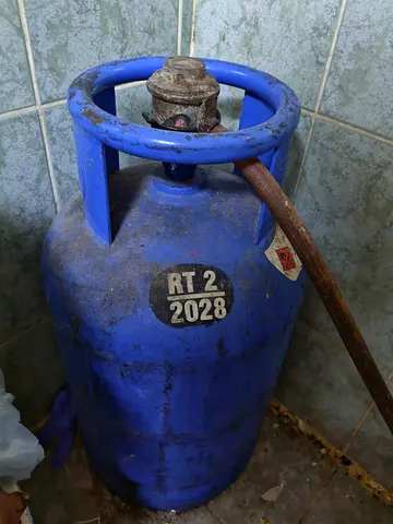 Used blue LPG gas cylinder - functional, needs inspection