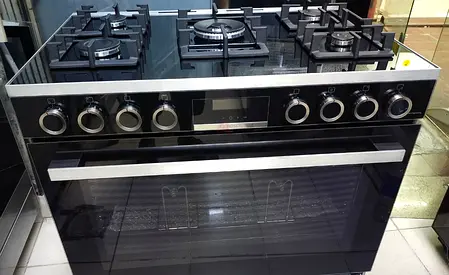 6-Burner Stainless Steel Gas Range with Large Oven - Good Condition