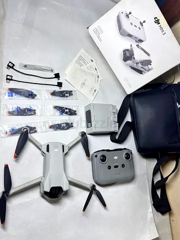 DJI Mini 3 with Controller, Extra Batteries  Props - Good Condition