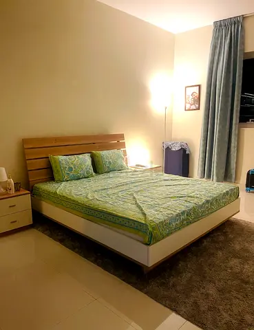 200cm * 200cm Super king size bed with headboard and carpet - good condition 300 AED negotiable