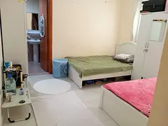 Furnished Master Bed Room available near Mall and f Emirates for Ladies or Couple