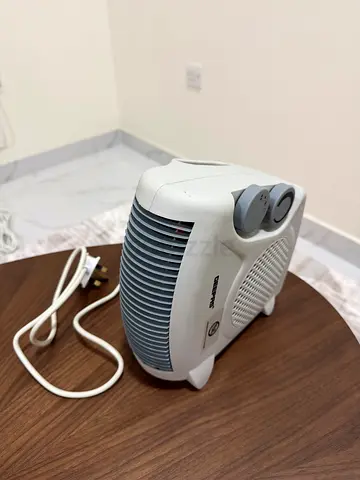 Small electric room heater - compact fan heater (used)