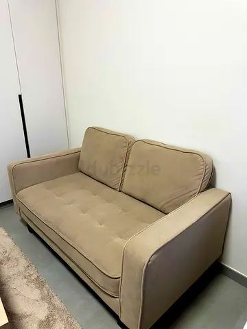 Beige 2-seater Sofa in Good Condition