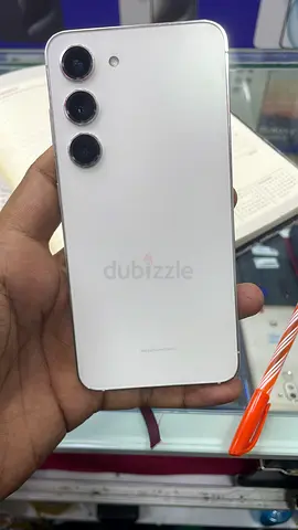 White Samsung smartphone with triple rear cameras - good condition