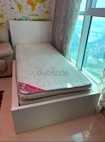 Single white wooden bed frame with mattress — good condition