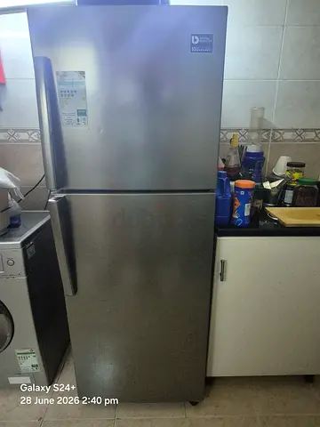 Used stainless steel top-freezer refrigerator - good condition