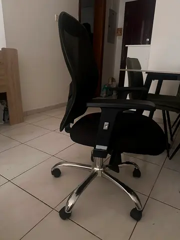 Black ergonomic office chair with lumbar support - good condition