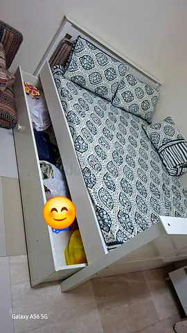 Queen size bed with full size drawer, mattress and two side tables