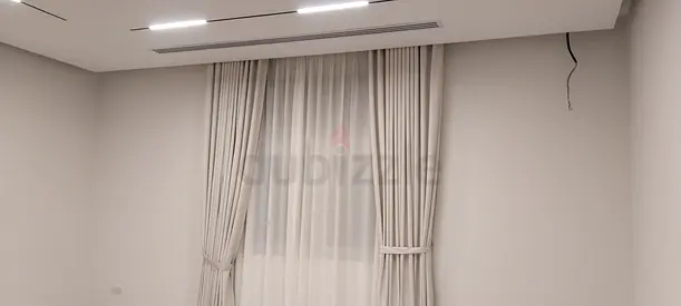Light cream floor-to-ceiling curtains with sheer panels - set for bedroom