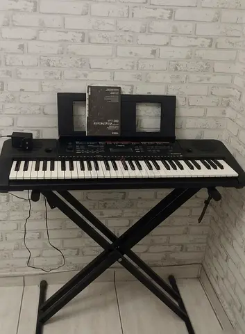 Yamaha Electronic Keyboard with Stand and Manual - Good Working Condition