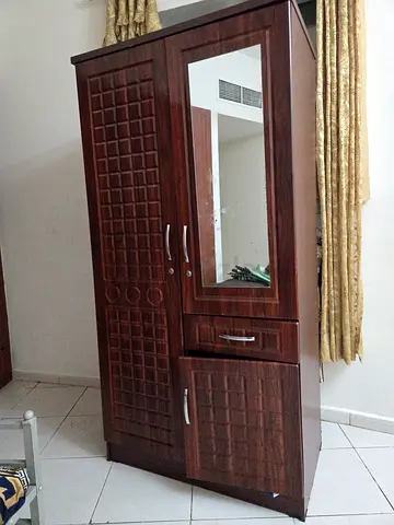 Wooden 2-Door Cupboard with Mirror – Excellent Condition, AED 250