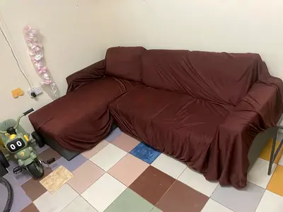 IKEA L-shaped Sofa Cum Bed with Storage — Good Condition With IKEA Coffee Table with Glass, AED 400