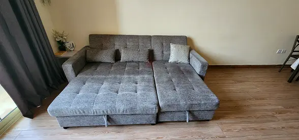 Sofa cum bed with storage space